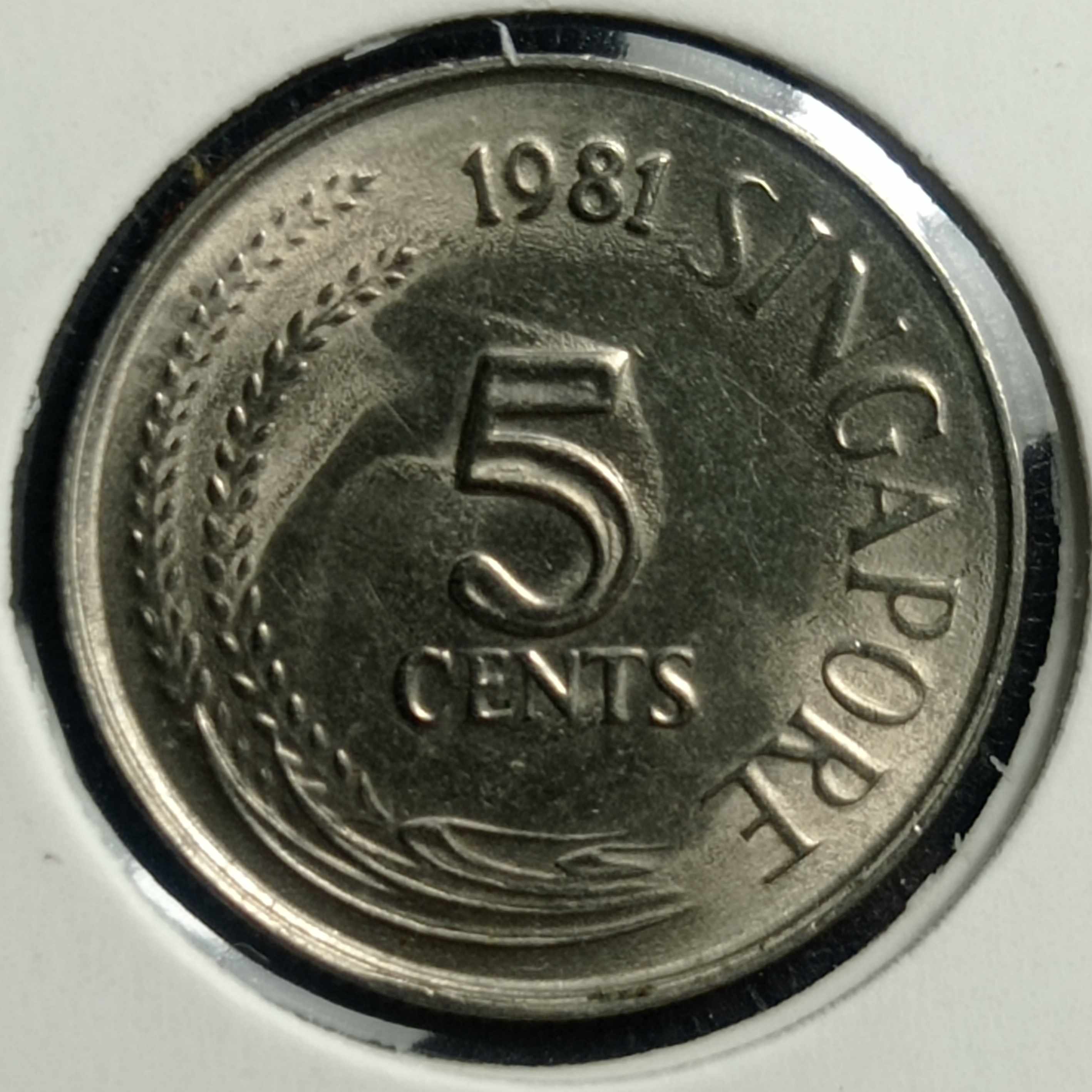 Is-That-An-Error-On-The-Reverse-Of-The-1981-Singapore-5�-Coin?